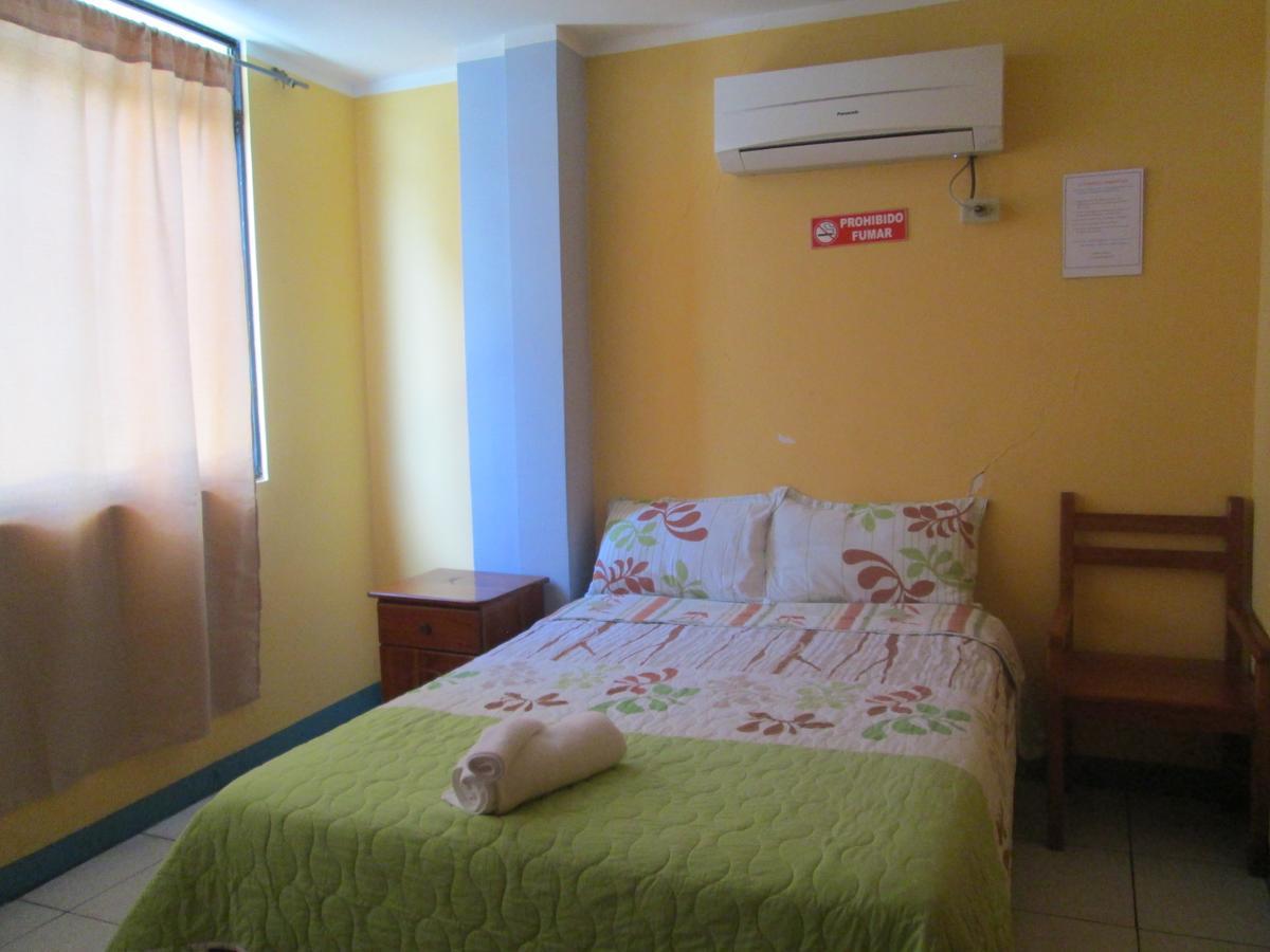 פוארטו בקריסו מורנו Hostal Leon Dormido מראה חיצוני תמונה